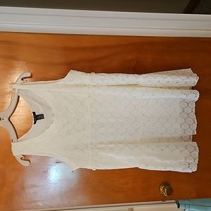 Off white summer dress or top.